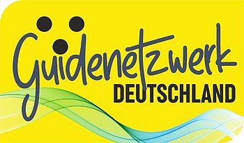 Schriftzug Guidenetzwerk Deutschland auf gelben Hintergrund.