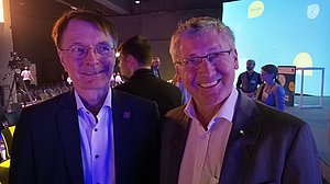 Gesundheitsminister Lauterbach (links) und der politische Referent der PRO RETINA (rechts)