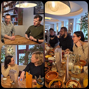 Mitglieder und eine neue Familie mit betroffenem Kind im Café Glocke